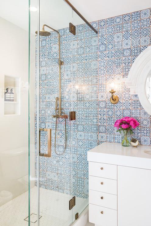 Photograph of accent wall of blue and white Moroccan tiles