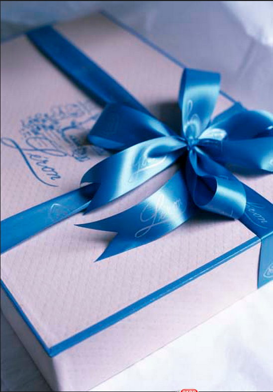 Blue linen gift box with bow