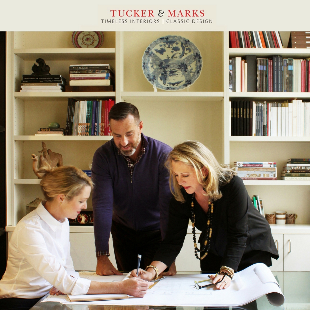 A designer in the office of Suzanne Tucker of Tucker and Marks meets with a client. 