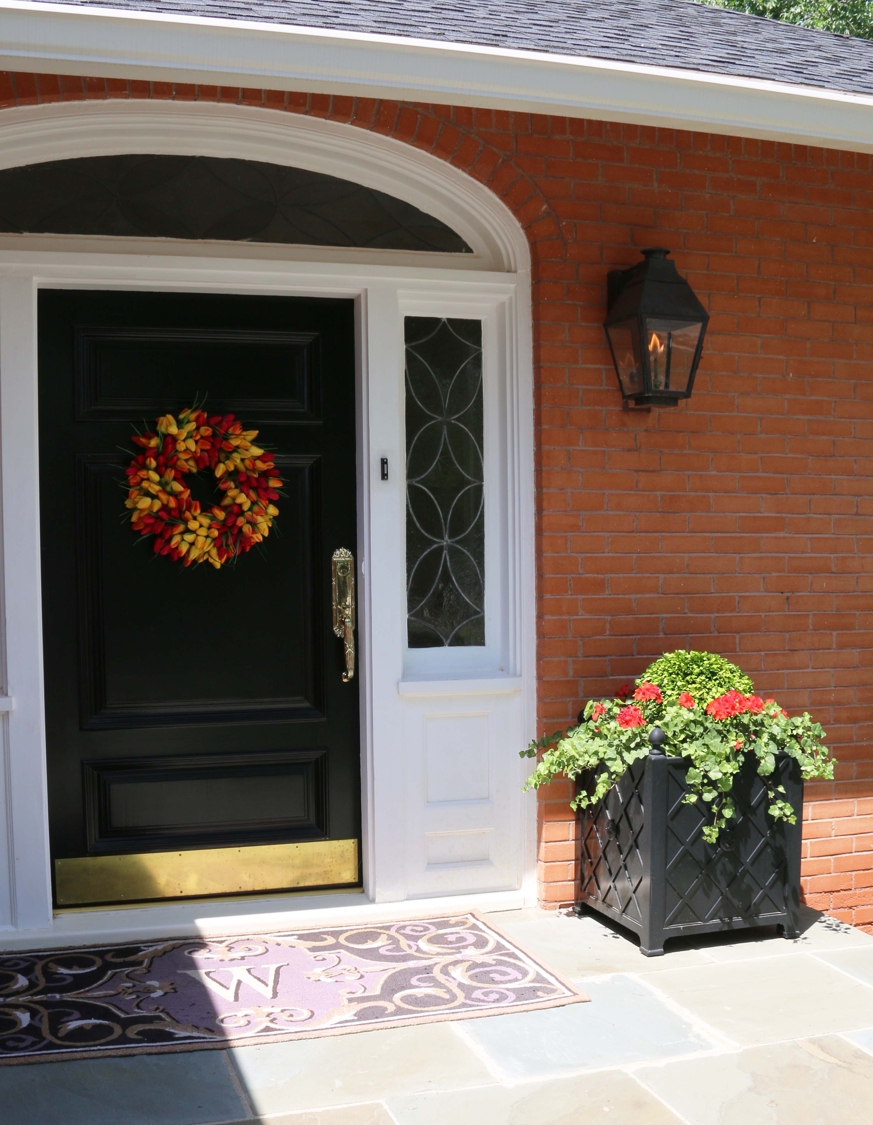 Decorated Front Porch with a beautiful spring wreath